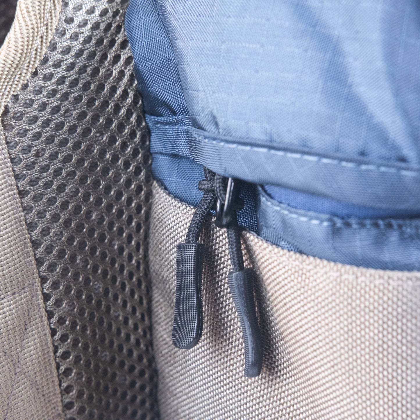 Close view of zipper detail on dog backpack built for hiking and travel